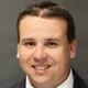 Scott D.